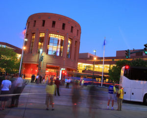 Minneapolis Convention Center Front Entrance with people and cars in motion